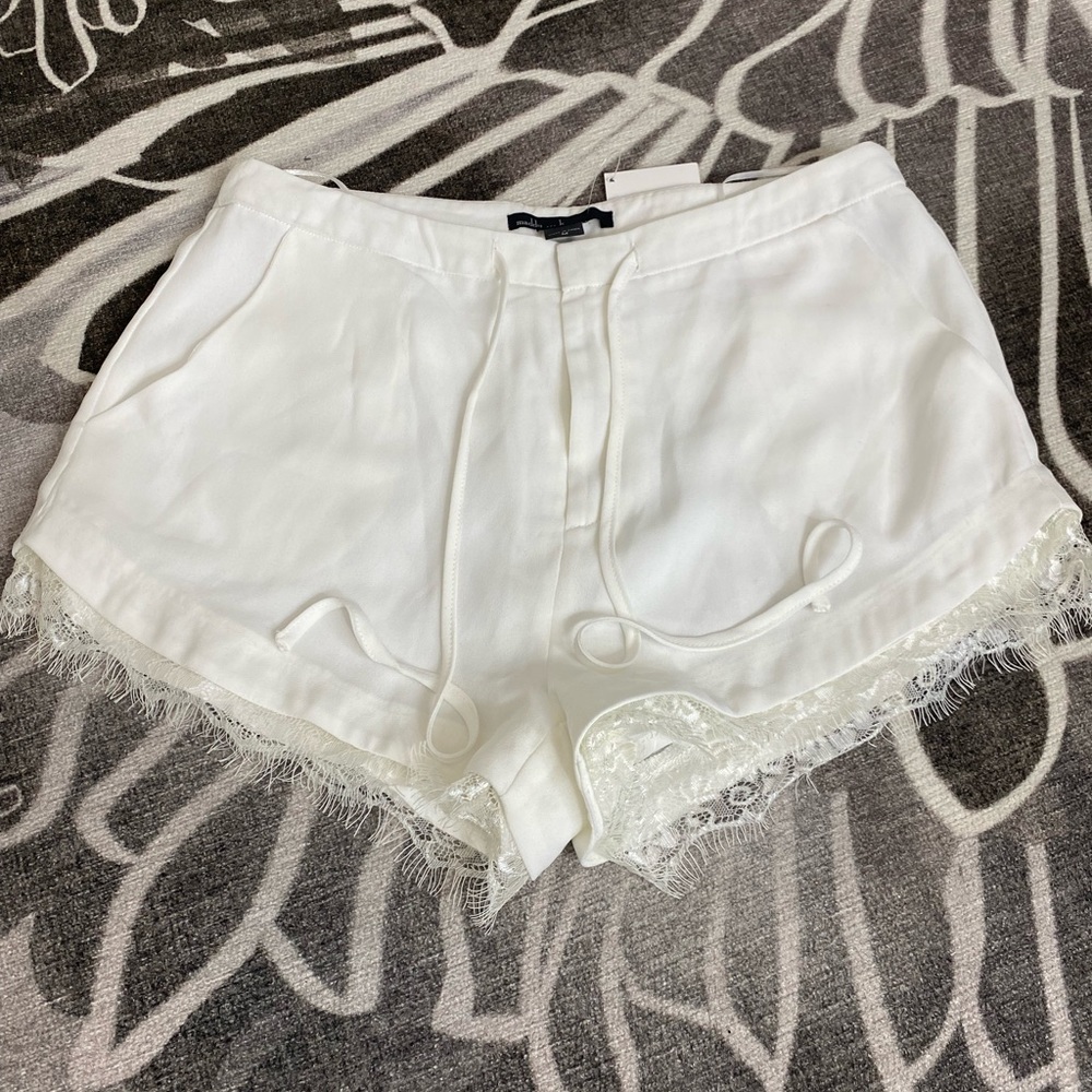 Dress shorts with lace trim.
